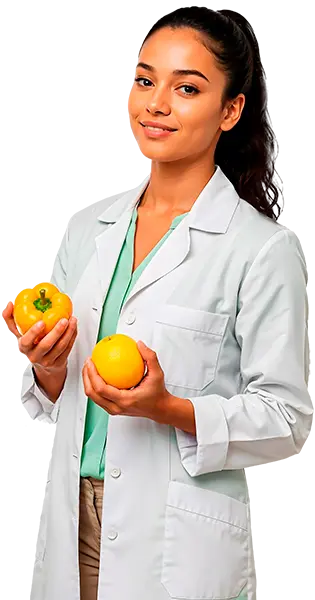 Nutricionista em pé segurando legumes frescos.